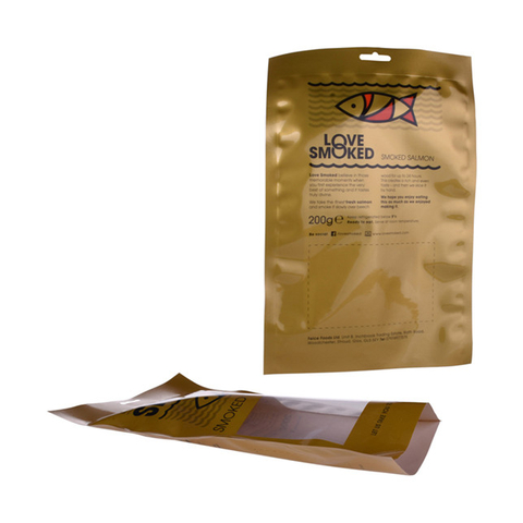 Laminated vacuum meat packaging with tear notch