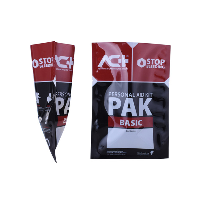 Laminated vacuum meat packaging with tear notch