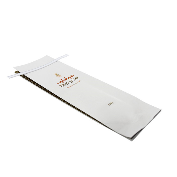Laminate side gusset one way valve coffee sachet with tin tie